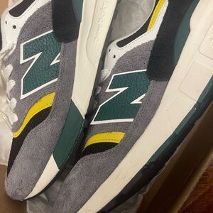 New Balance Black and Cream Sneakers